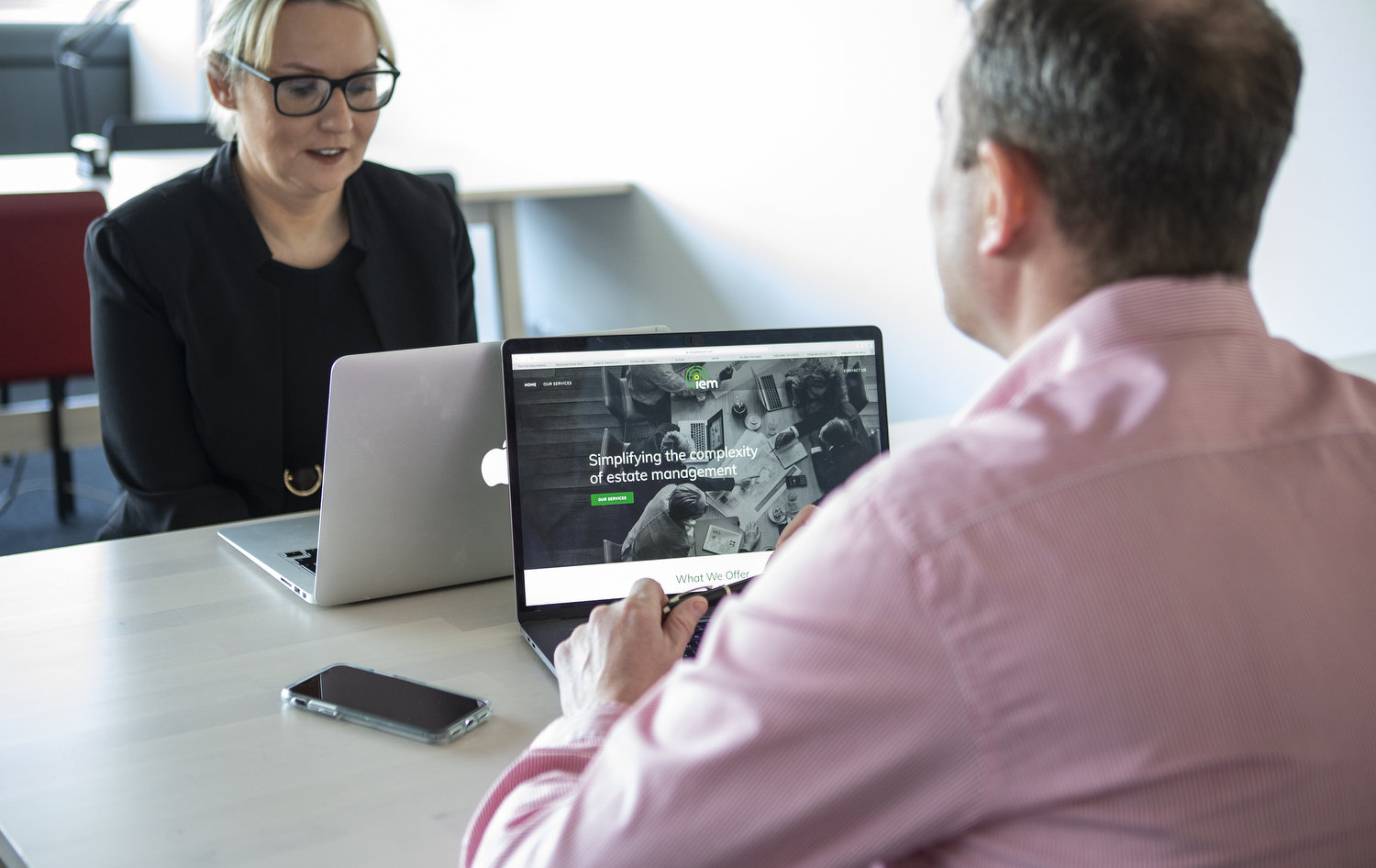 IEM Employee With Client